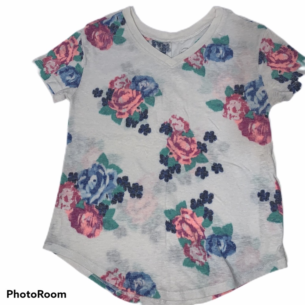 Girls Justice v-neck T-shirt with pink flowers.